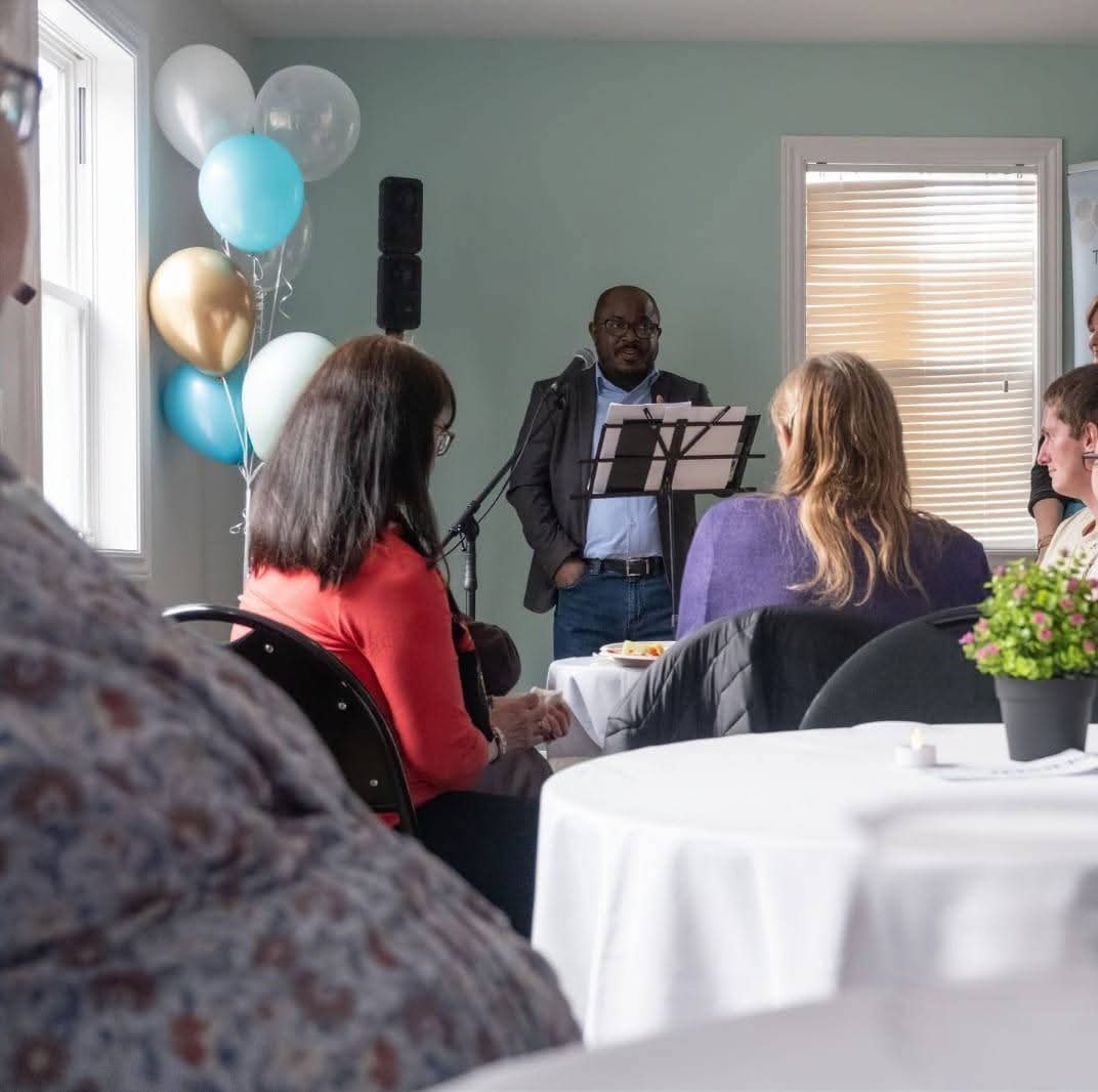 Rufai Bishi speaking at an event