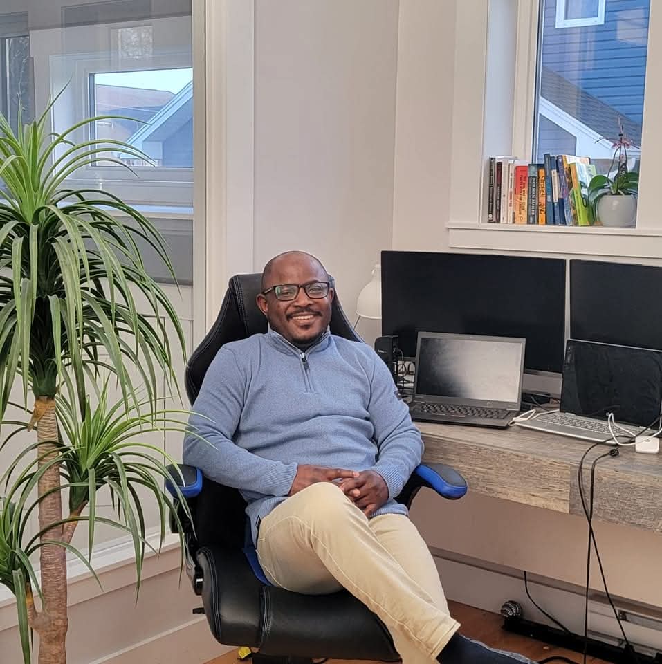 Rufai Bishi in his home office workspace